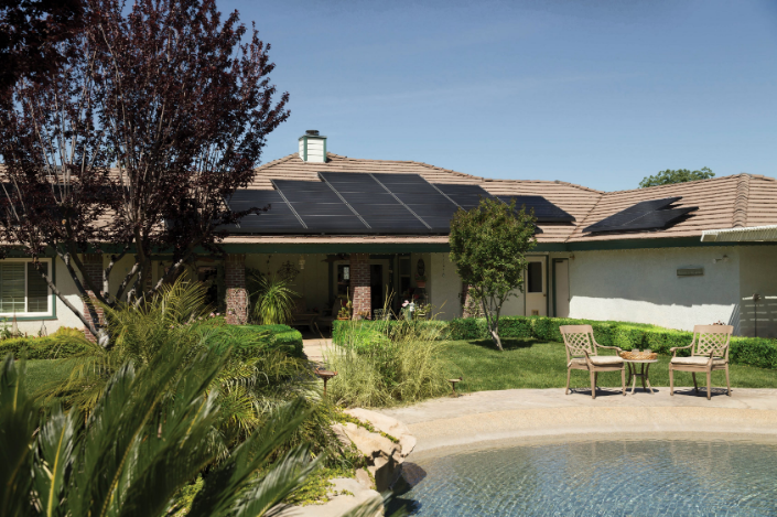 A house with solar panels installed on the roof